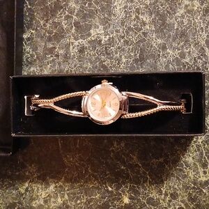 Avon Two-tone Twist Watch